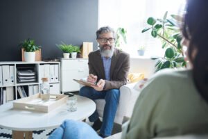 Friendly senior psychologist
