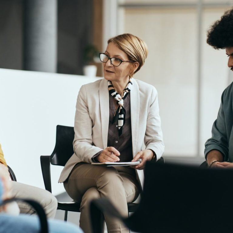 Social workers in a group clinical supervision and case consultation session
